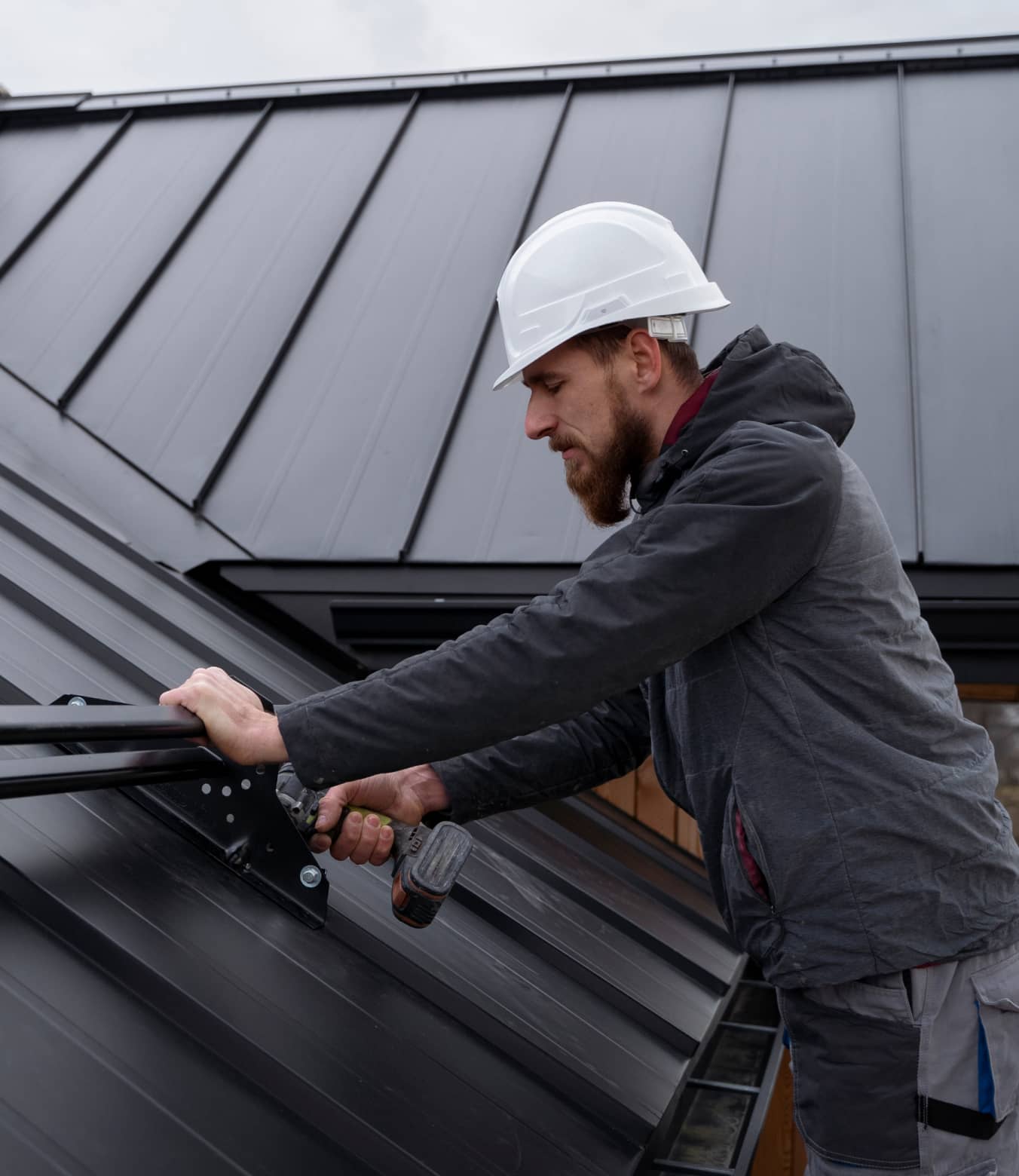 Xerob's Roofing team reviewing roof plans